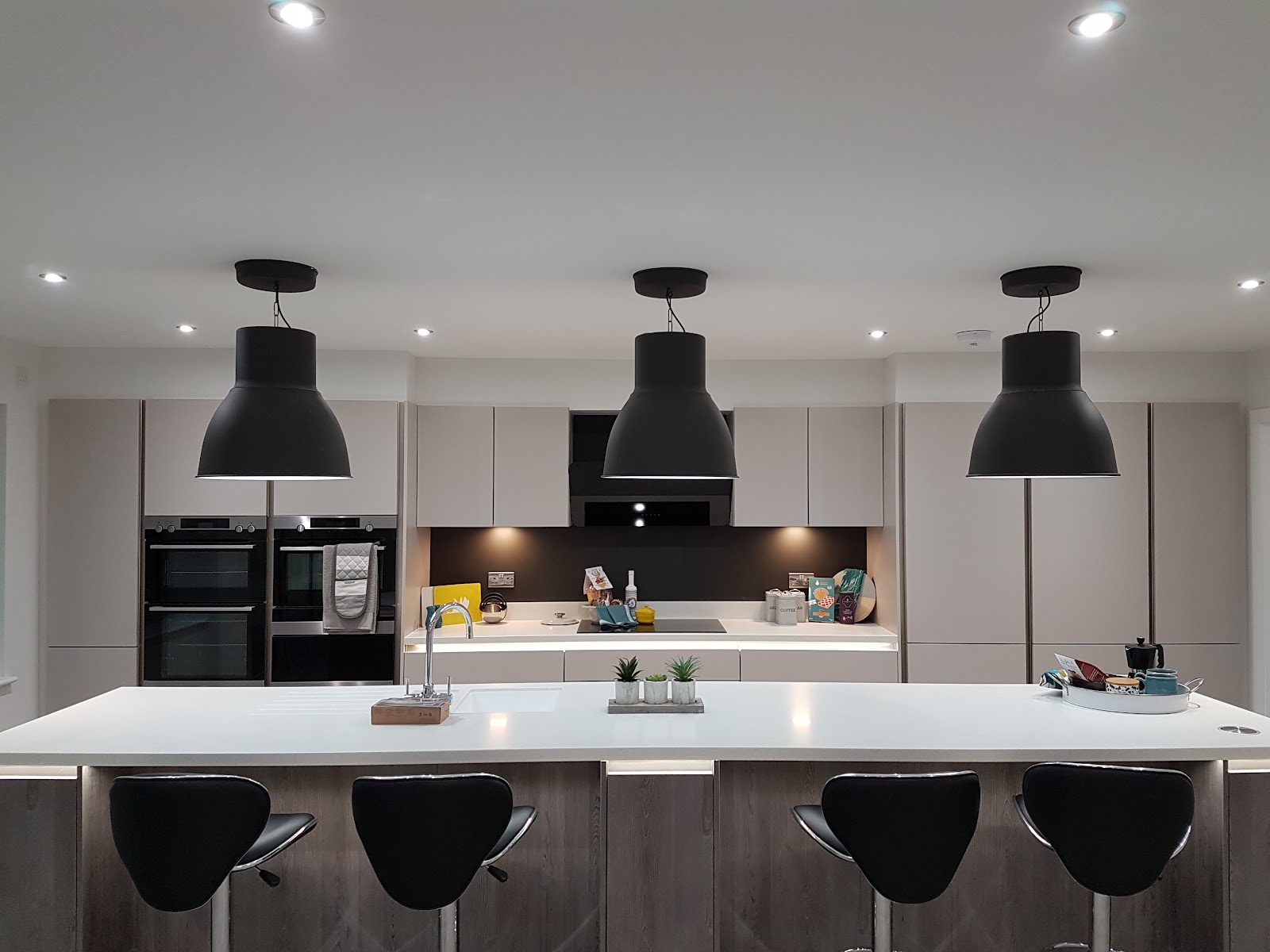 A modern Southampton kitchen lit by pendant and recessed lighting installed by TG Electrical